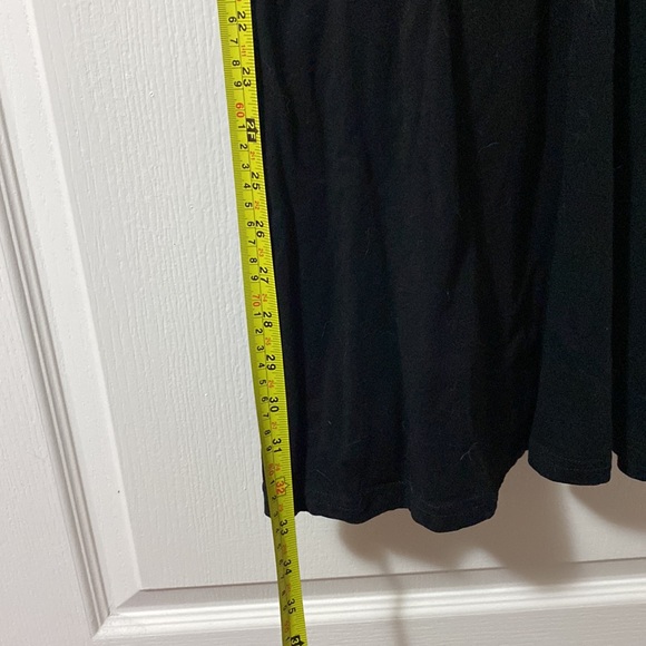 Black mini dress with lace back and lace side detail. - Picture 6 of 7